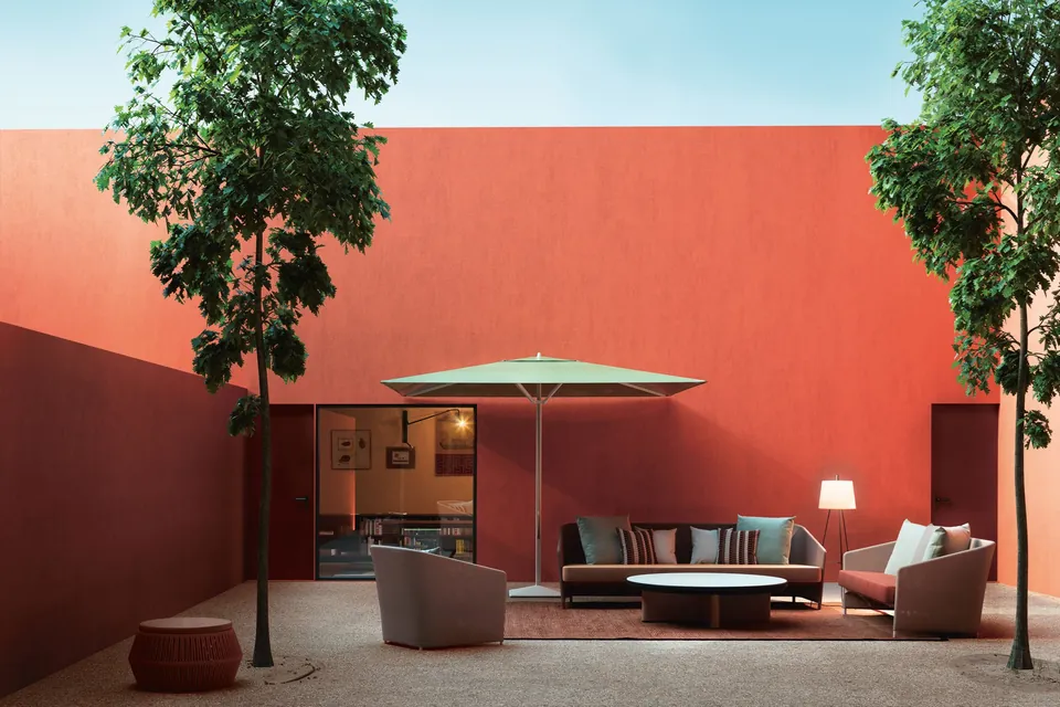 Kettal Bitta Lounge outdoor furniture in use, catalog photograph