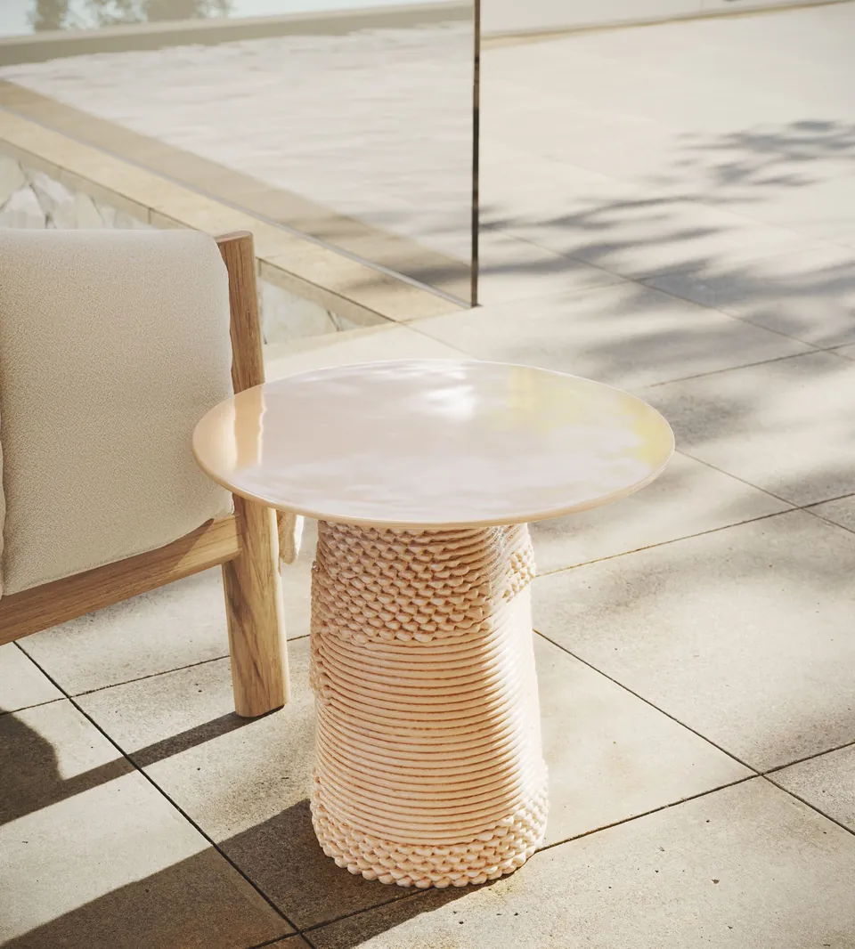 Kettal Plumon outdoor furniture in use, catalog photograph