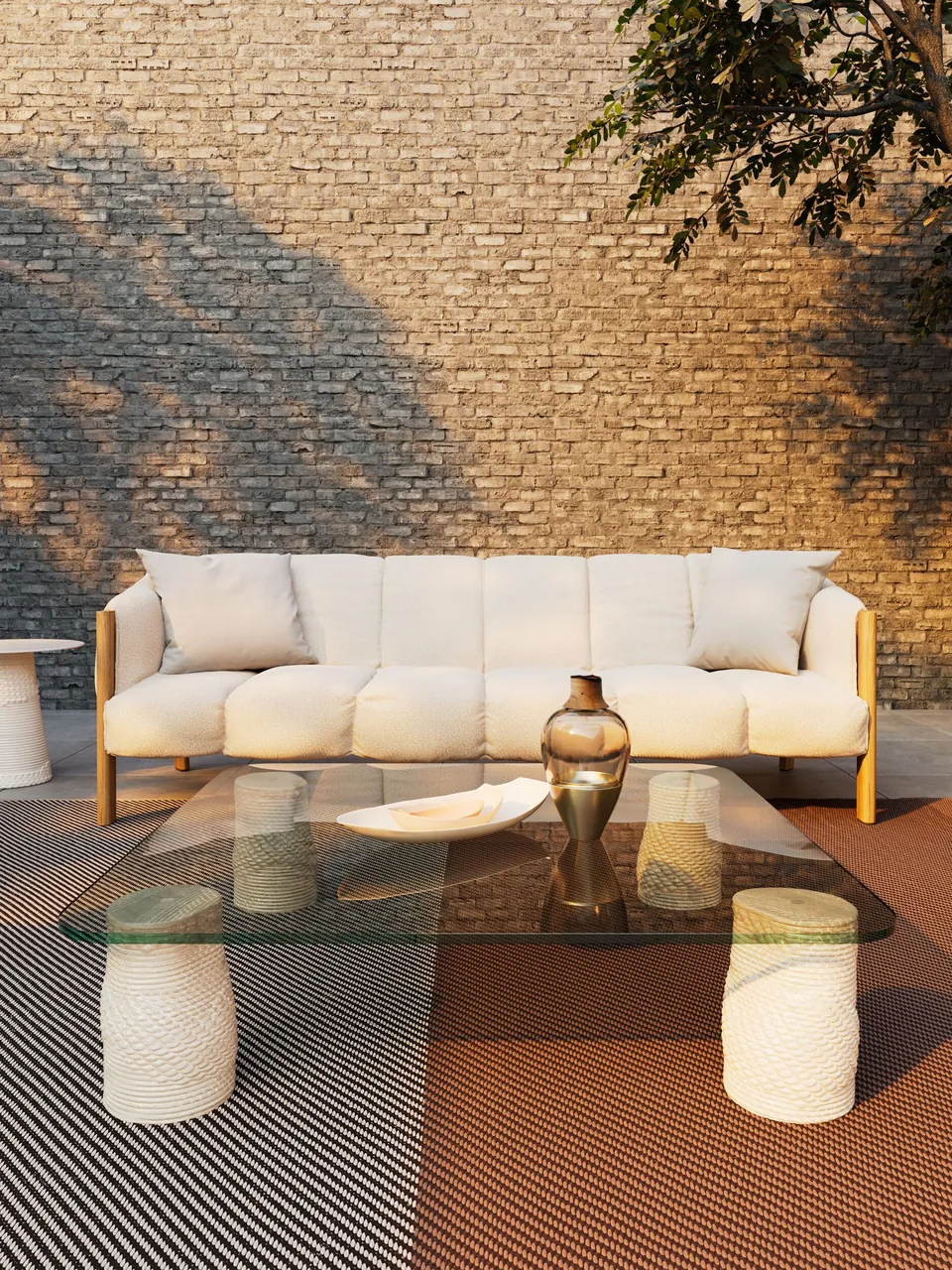 Kettal Plumon outdoor furniture in use, catalog photograph