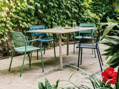 Kettal Village outdoor furniture in use, catalog photograph